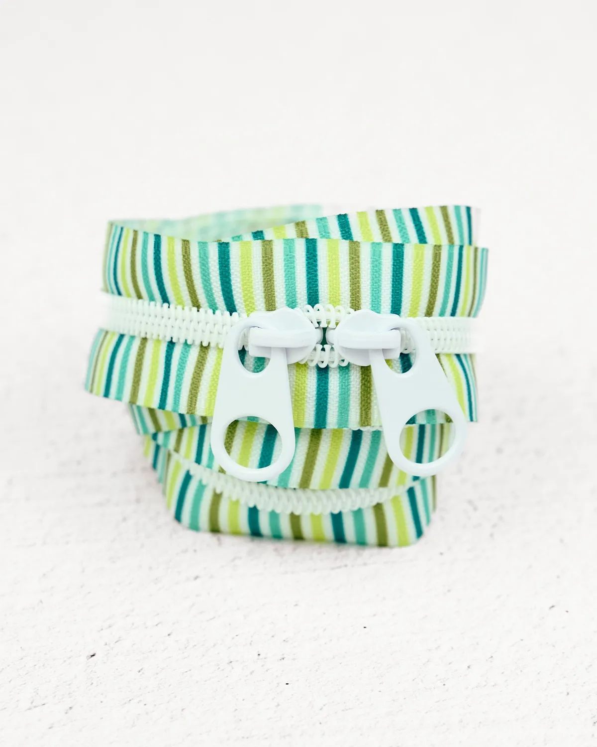 Renaissance Ribbon Coastal Glow #5 Reissverschluss